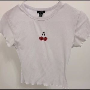 White cropped top with cherries